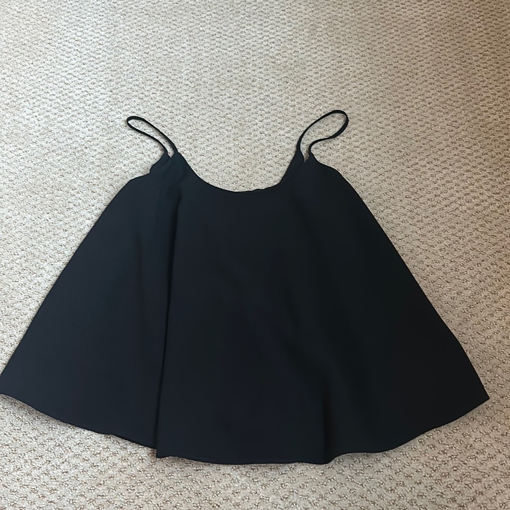 Going out black Cami that’s flared can be dressed down and dressed up
